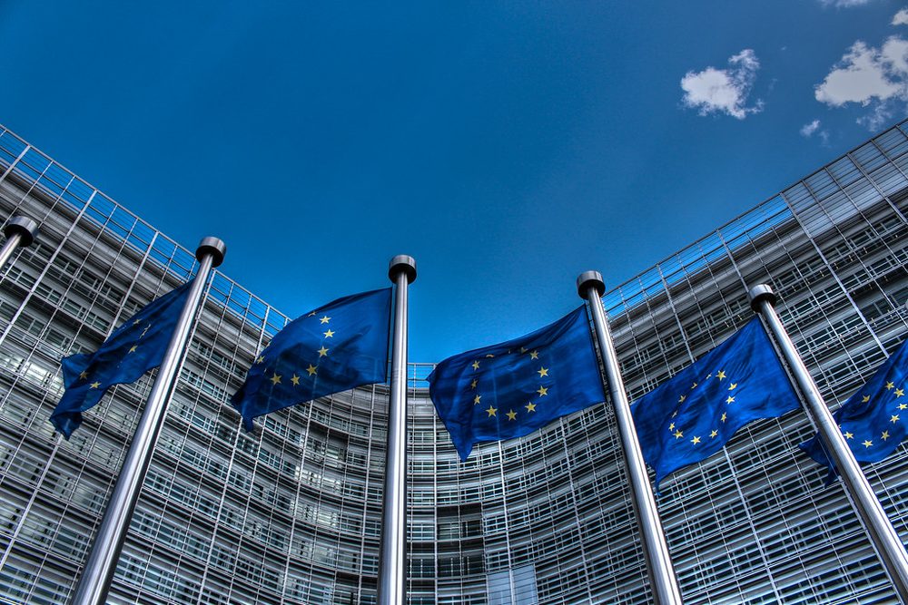 The European Parliament building and flags